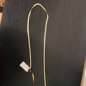 Long gold jewellery necklace